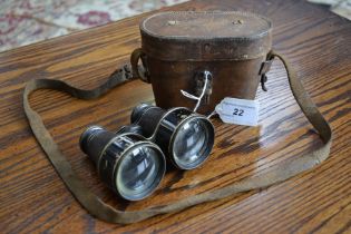 A pair of Ross, London leather cased World War One binoculars stamped Civil Service.