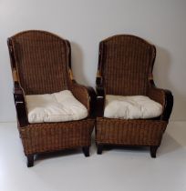 Pair of wooden-frame and rattan armchairs with removable cushions. Collection only.