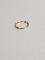 9ct gold wedding band, size K. Shipping Group (A).