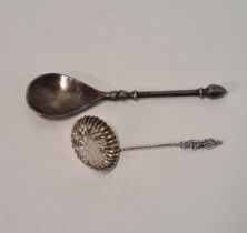 Silver sifter spoon, hallmark for London. Together with an earlier white metal spoon. Shipping Group