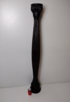 A nicely turned wooden torchière standing 150cm. Collection only.