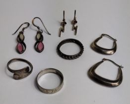 Silver jewellery lot; (3) rings and (3) pairs of earrings. Shipping Group (A).