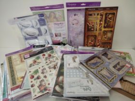 Large selection of crafting papers, embellishments etc., to include Hunkydory. Collection only.