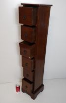 Hardwood 6-drawer unit measuring 128x26cm. Collection only.