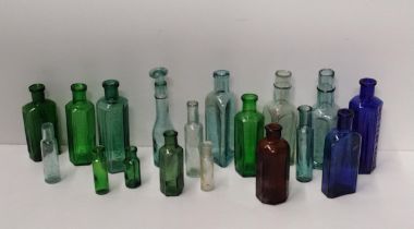 Quantity of vintage coloured glass bottles. Collection only.