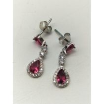 .925 silver, cubic zirconia and red stone earrings. 2.5cm drop Shipping Group (A).