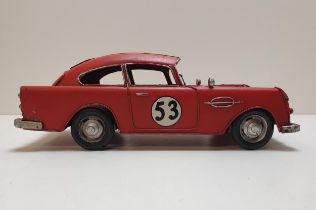 Large scale mode tinplate Aston Martin car. Shipping Group (A).