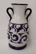 Large twin-handled earthenware pottery amphora, blue and white glaze, standing approx 48cm.