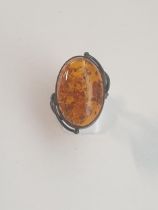 .925 silver and amber set dress ring, size Q. Shipping Group (A).