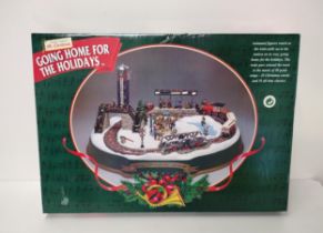 Musical Christmas decoration scene "Going home for the holidays" As new in box. Collection only.
