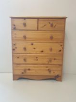 Pine 2 over 4 chest of drawers measuring H:98 x W:81 x D:39 cm Collection only.