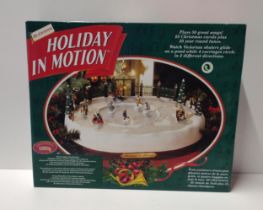 As new boxed Christmas scene "Holiday in motion ". Collection only.