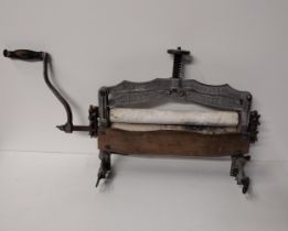 Antique mangle by ACME Co., Glasgow. Collection only.