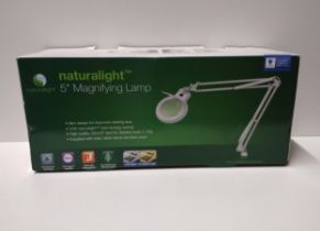 As new 6 inch diameter illuminated magnifying lamp. Collection only.