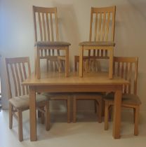 Light oak table and 6 chairs. Collection only.