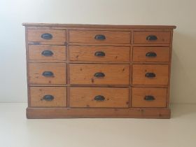 Antique pine chest of (12) drawers. H:80 x W:124 x D:44 cm. Collection only.