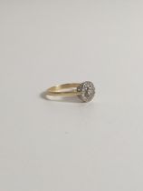 Hallmarked 18ct yellow gold and diamond set ring, size R. Shipping Group (A).