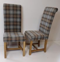 Pair of modern light oak dining chairs, upholstered in tartan fabric. Collection only..