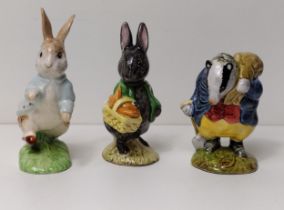 (3) Beswick figurines; 'Peter Rabbit', 'Little Black Rabbit' and 'Tommy Brock'. Shipping Group (B).