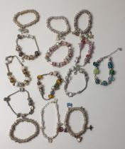 Large selection of charm bracelets. Shipping Group (A).