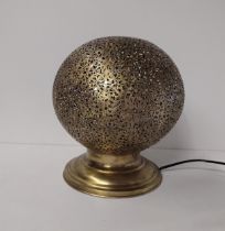 Modern metal globe table lamp having pierced detail. Standing approx 20 cm. Collection only.