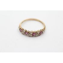 9ct gold ruby and clear gemstone multi-row half eternity ring, size O. Shipping Group (A).