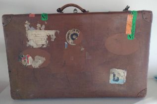 Well-travelled vintage leather suitcase. Collection only.