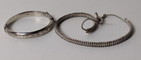 Links of London .925 silver necklace together with a silver bangle. Weight 37g. Shipping Group (A).