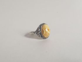 Silver and butterscotch amber set ring, size N½. Shipping Group (A).