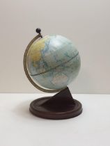 Chad Valley tinplate globe on stand. Shipping Group (A).