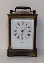 A John Hall & Co., brass and bevelled glass carriage clock, French movement stamped E.M & Co.
