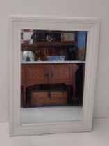 Large bevelled edge mirror in a substantial white painted frame. Collection only.