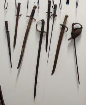 Assortment of antique swords and bayonets. Collection only.
