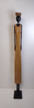 Very tall African origin carved wooden figure, H:180 cm. Collection only.