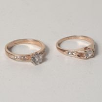 18ct gold-plated and cubic zirconia rings (2), size R. Shipping Group (A).