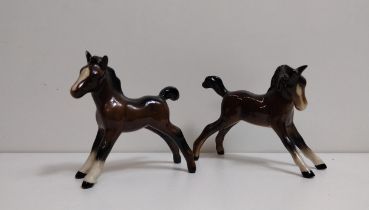2 Beswick foal figures. Shipping Group (A).