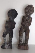 2 African fertility figures, tallest 28cm. Shipping Group (A).