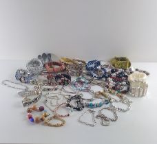 Over 50 assorted bracelets. Shipping Group (A).