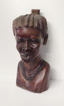 A large and nicely carved African bust, H:45 cm.  Collection only.