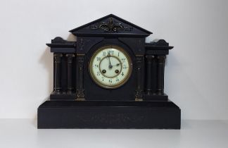 Antique 8 day black slate clock. H:33 x W:42 x D:14 cm. Collection only.