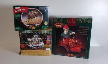 3 boxed Christmas decorations including light-up and musical examples. Shipping Group (A).