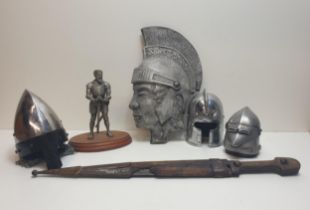 Decorative metalware including model knights helmets. Shipping Group (A).