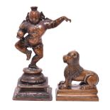 Krishna mit Butterball / Löwe. Indien u.a. (?) | Bronze.