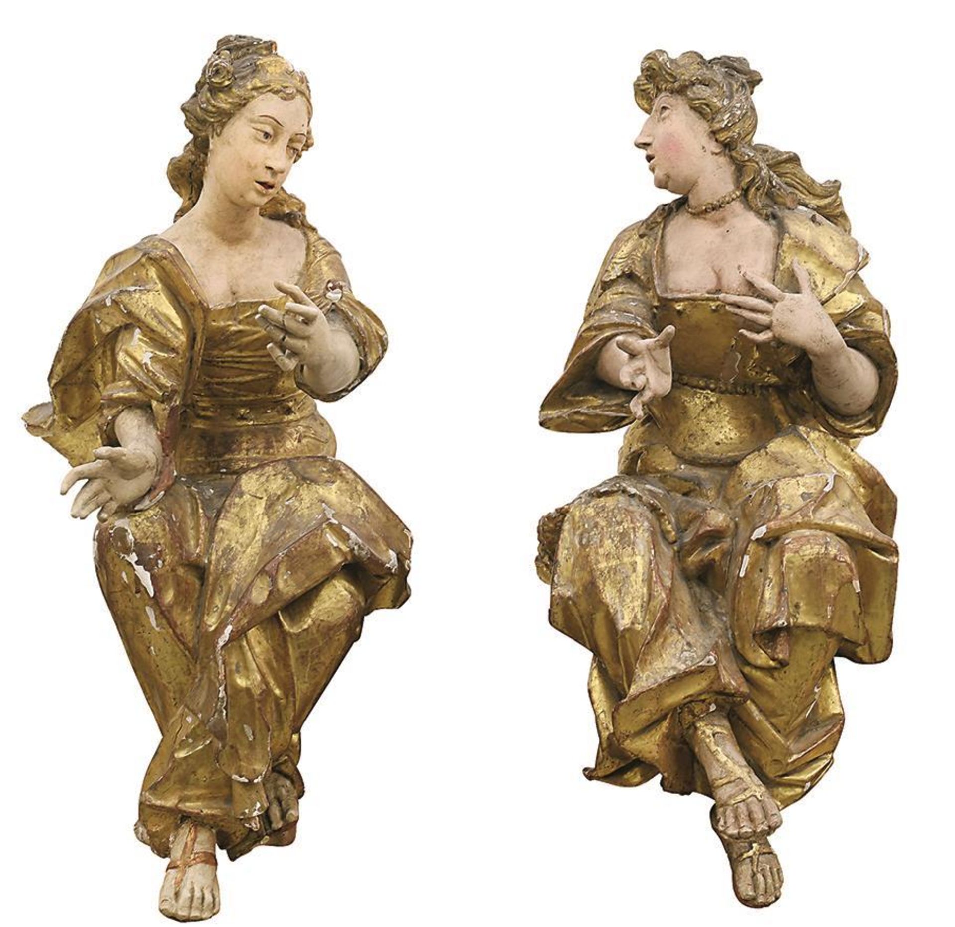 Ein Paar sitzende Frauenfiguren. Süddeutsch, 18. Jh. | Holz, geschnitzt, Gold- und Farbfassung.