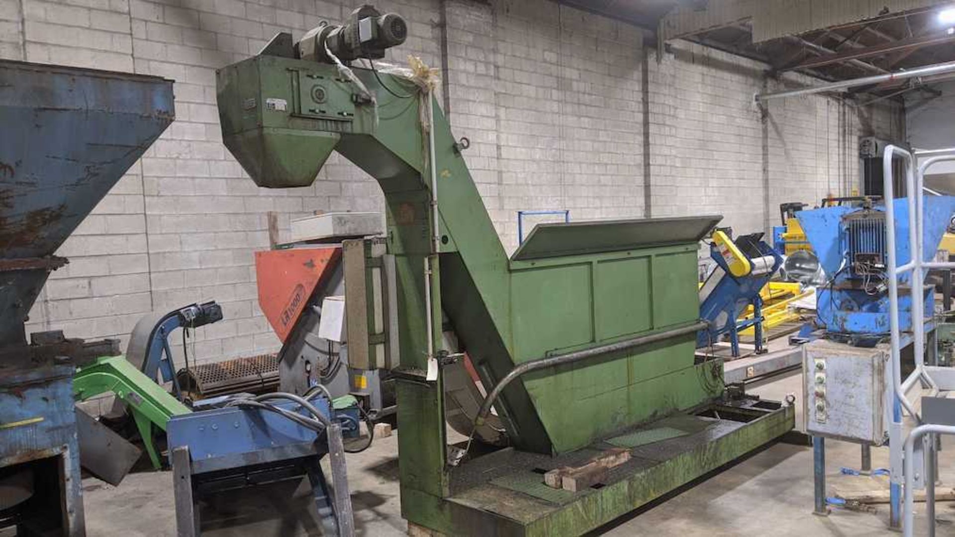 (Located in Zion, IL) 11"W x 56" Used Incline Feed Conveyor, Large Feed Hopper, Approximate Drop