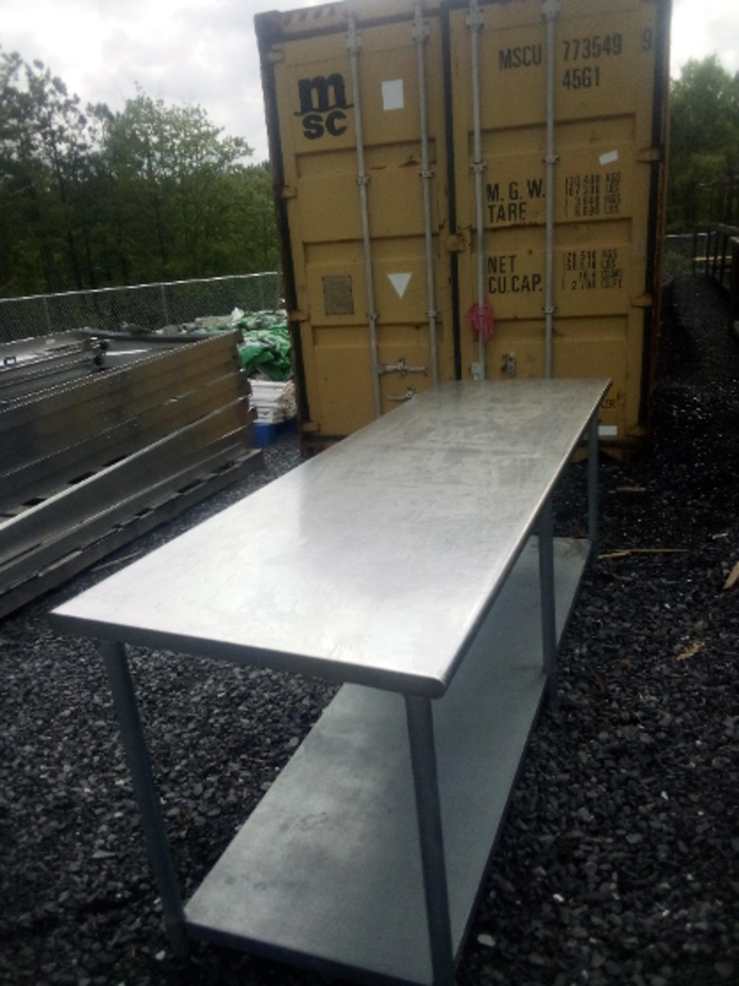 (Located in Waterfall, PA) Stainless Steel Table, 24 inches wide x 6 ft long x 34 inches high