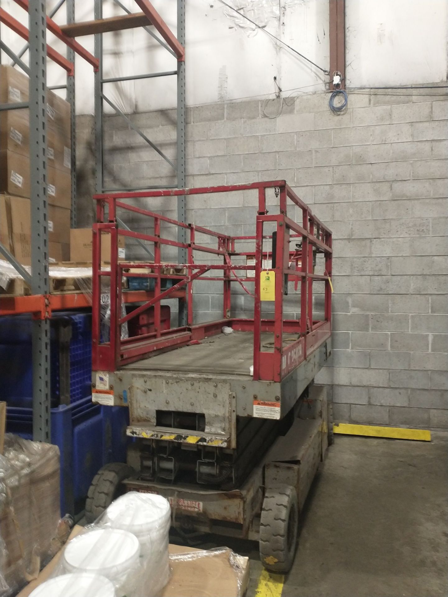 Battery operated scissor lift. New batteries, but brakes don’t work. Sold as-is-where-is. Foot