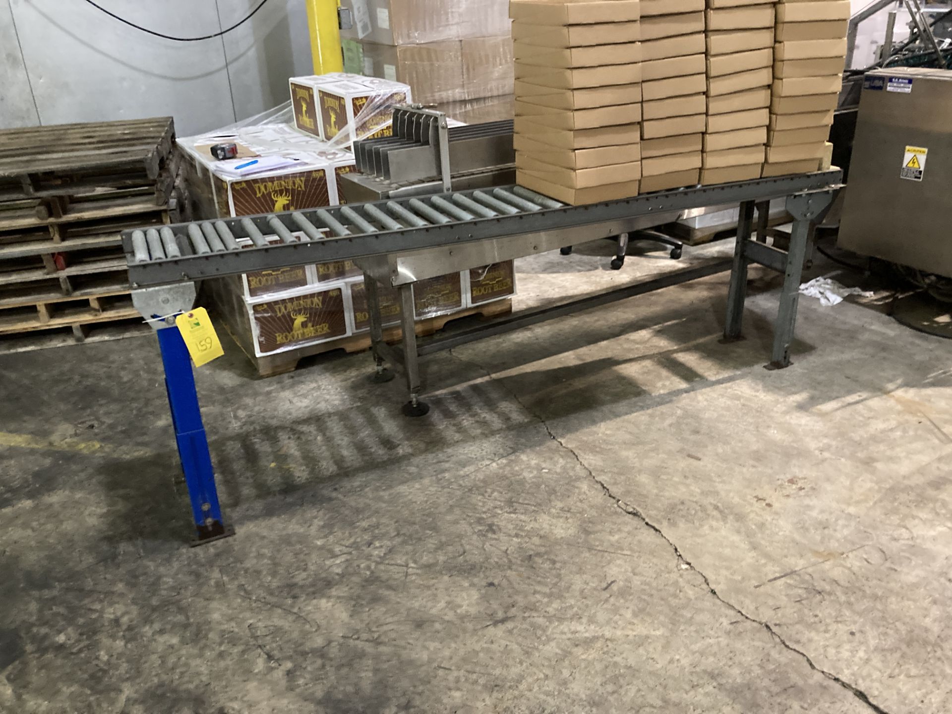 Roller conveyor , 8 ft lg x 12 in w ***Rigging and Loading Fee of $100 will be automatically