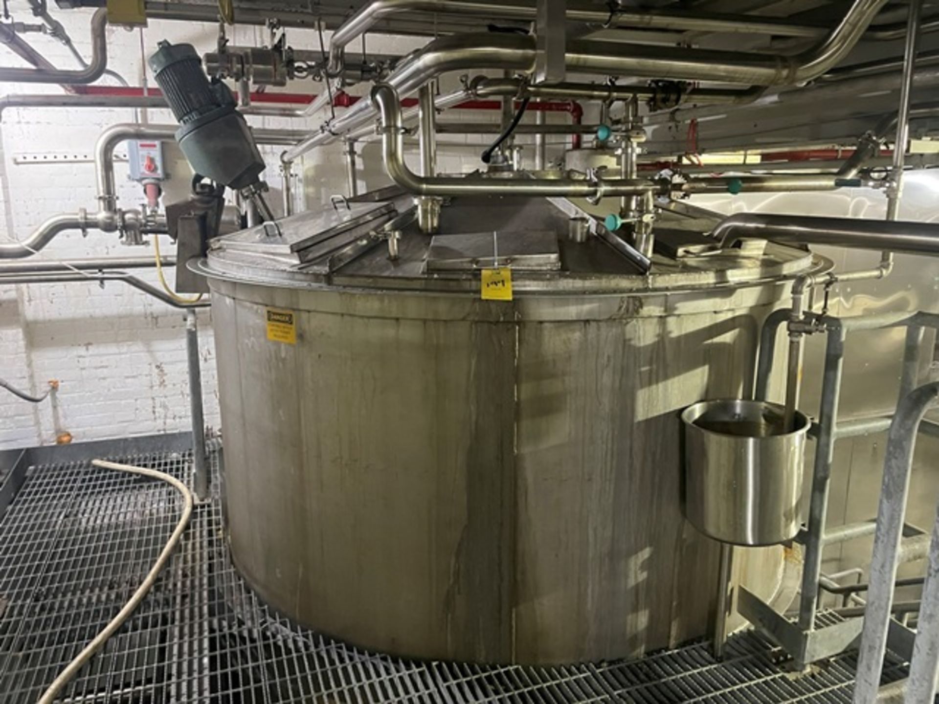 Stainless Steel Tank, Approx. 84" Diameter x 12', Includes Mixer, Rigging & Loading Fee: $4000