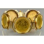 Münzarmband mit fünf goldene Münzen. 750 Gelbgold-Fassung.